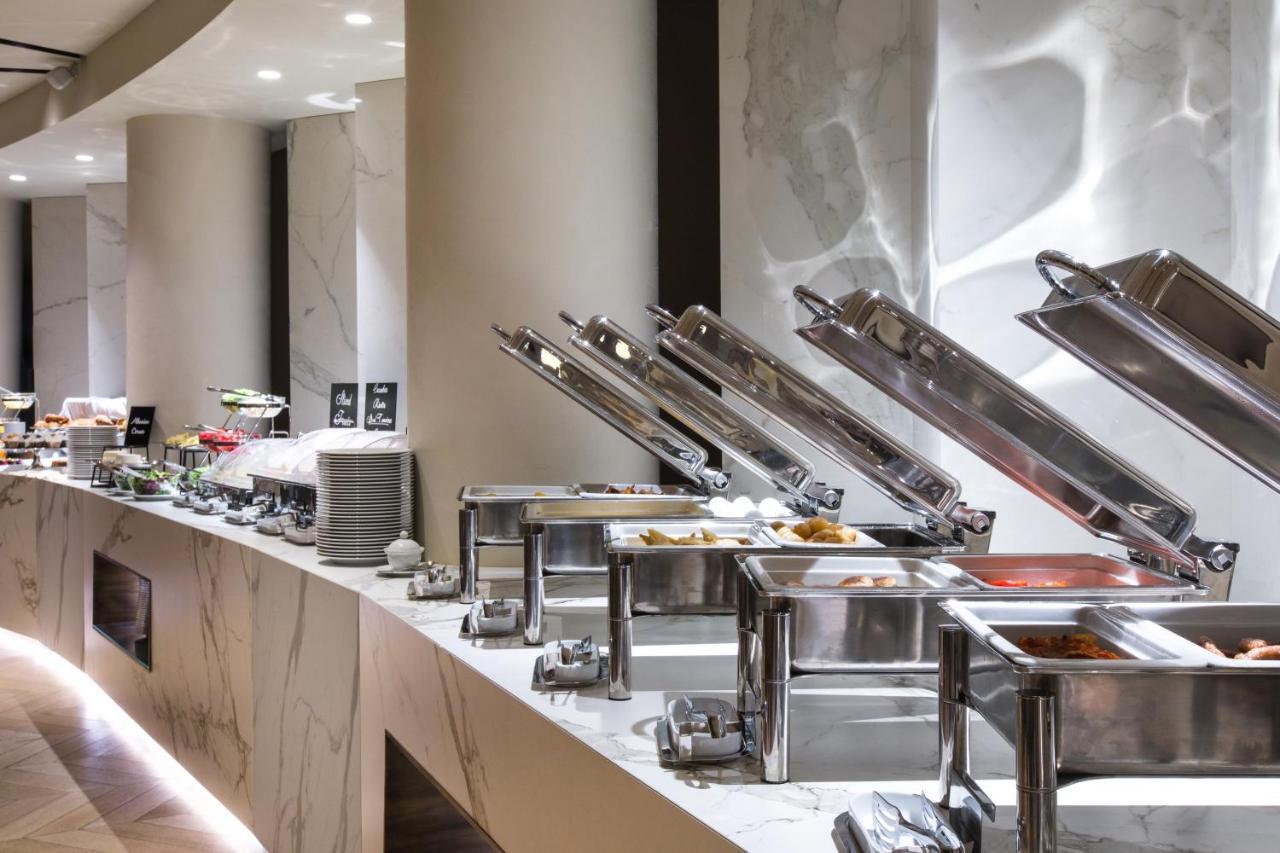 Maritim Hotel Plaza Tirana Exterior photo A buffet at a hotel