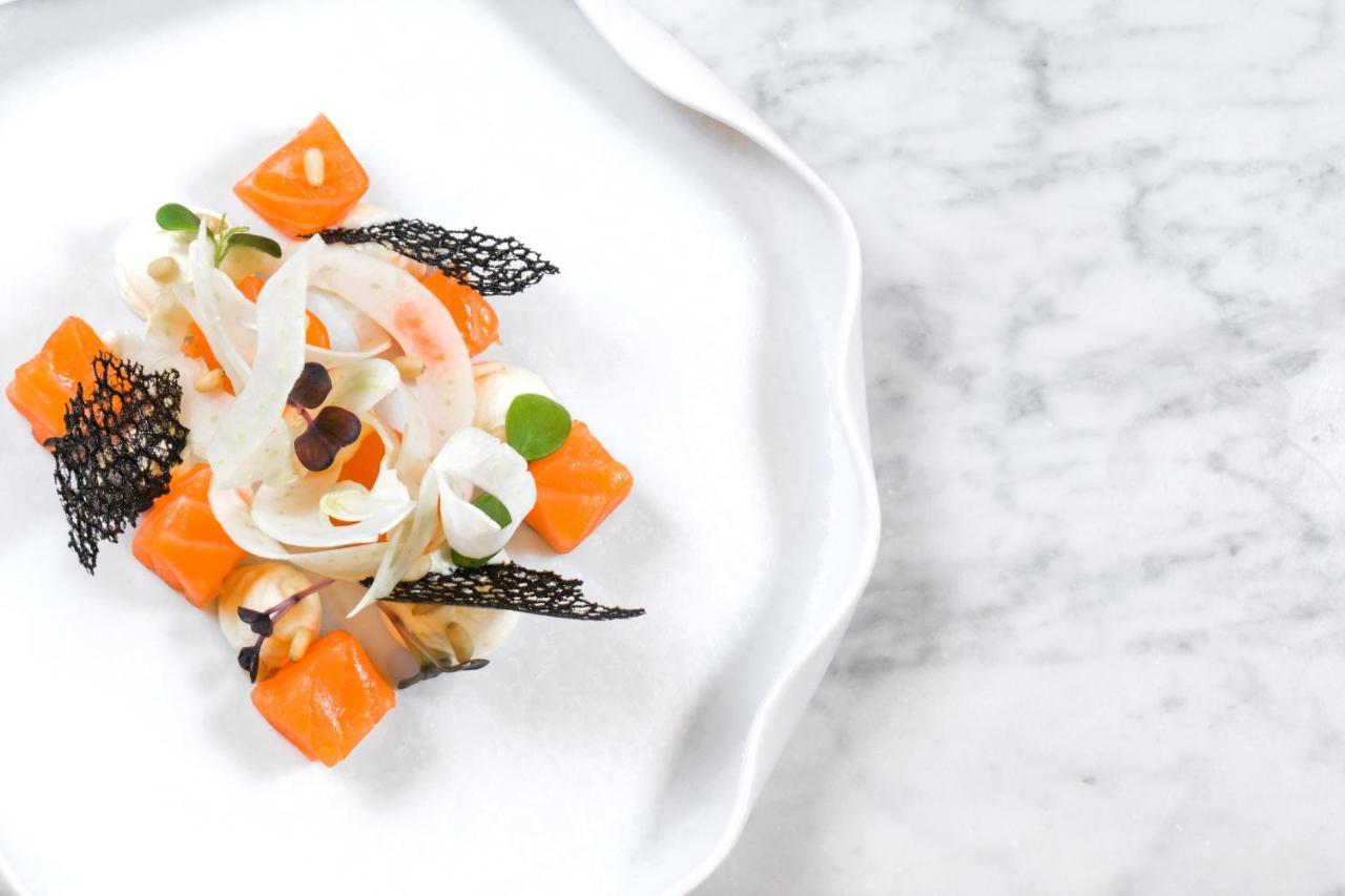 Maritim Hotel Plaza Tirana Exterior photo A salad prepared with the edible flowers of the Japanese anemone