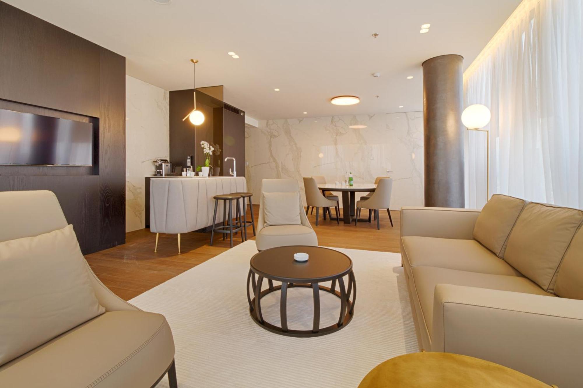 Maritim Hotel Plaza Tirana Exterior photo A living room in a serviced apartment in Frankfurt, Germany